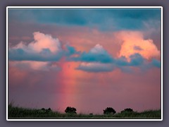 Ein Sonnenuntergang mit REgenbogen