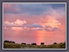 Sonnenuntergang trifft Regenbogen